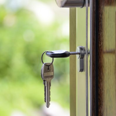 Front door with a key in the lock